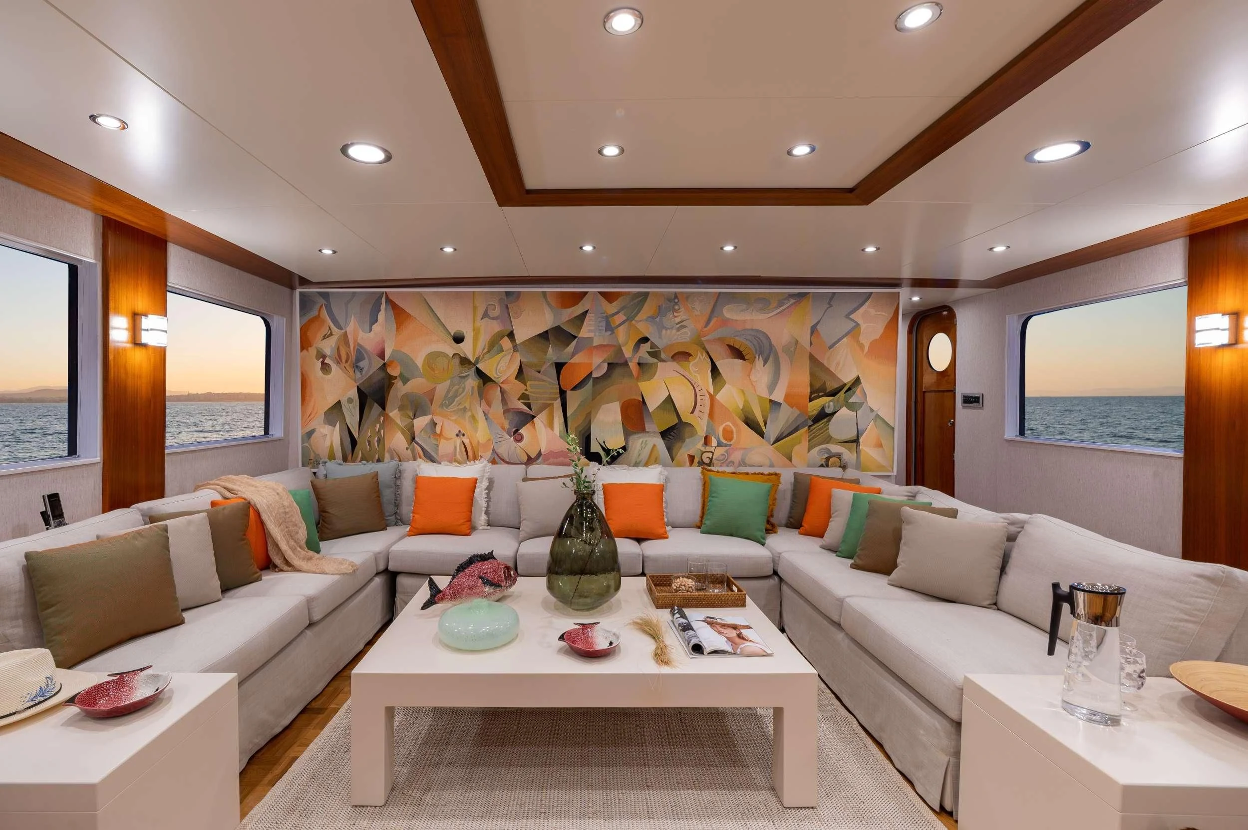 a living room with a large window aboard TAKA Yacht for Sale