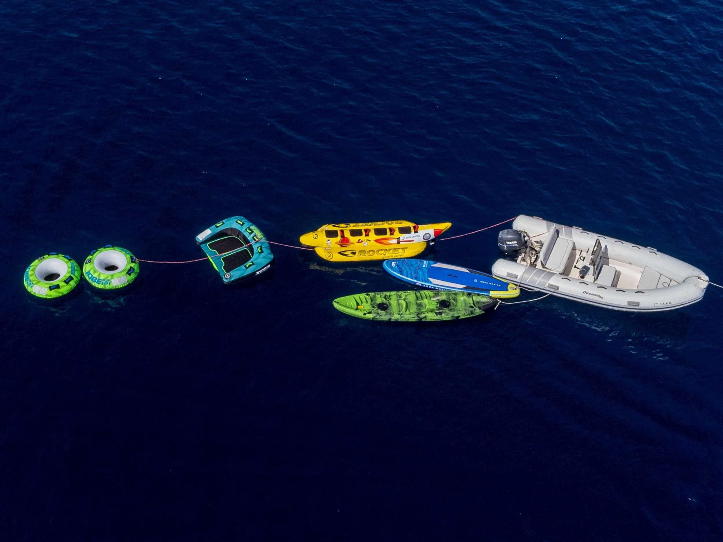 a couple of boats in the water aboard TAKA Yacht for Sale