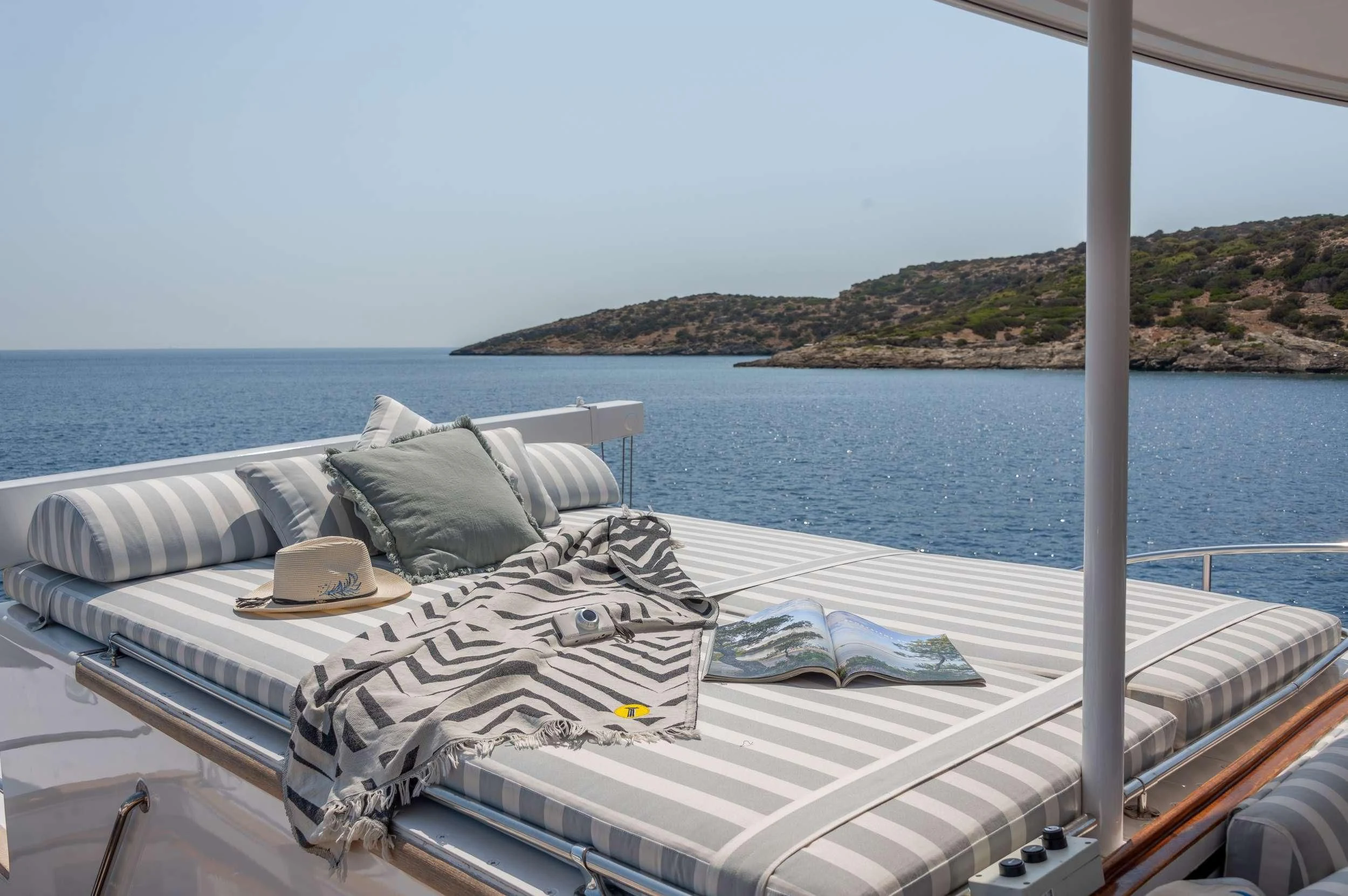 a bed on a boat aboard TAKA Yacht for Sale