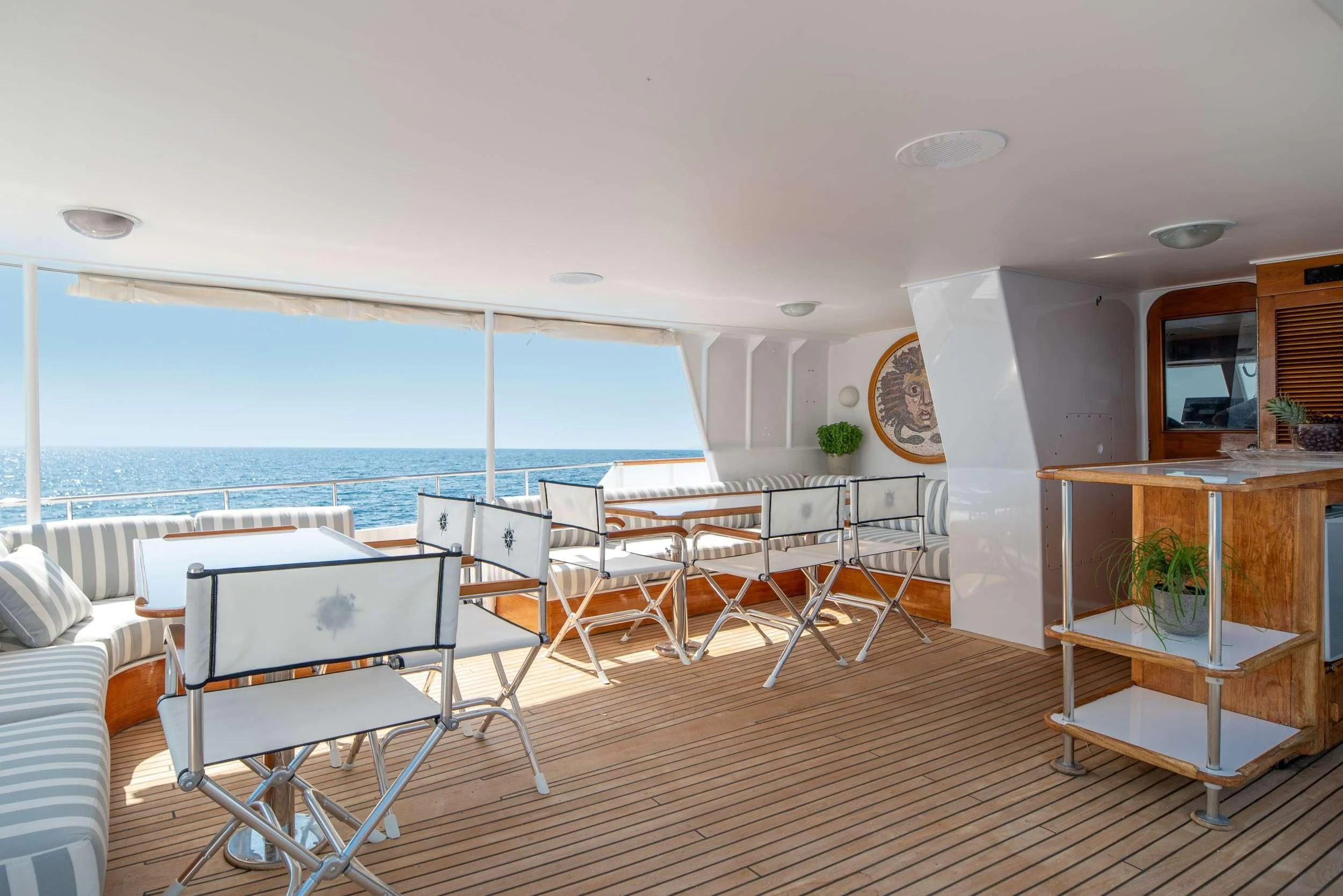 a room with a view of the ocean and the deck aboard TAKA Yacht for Sale