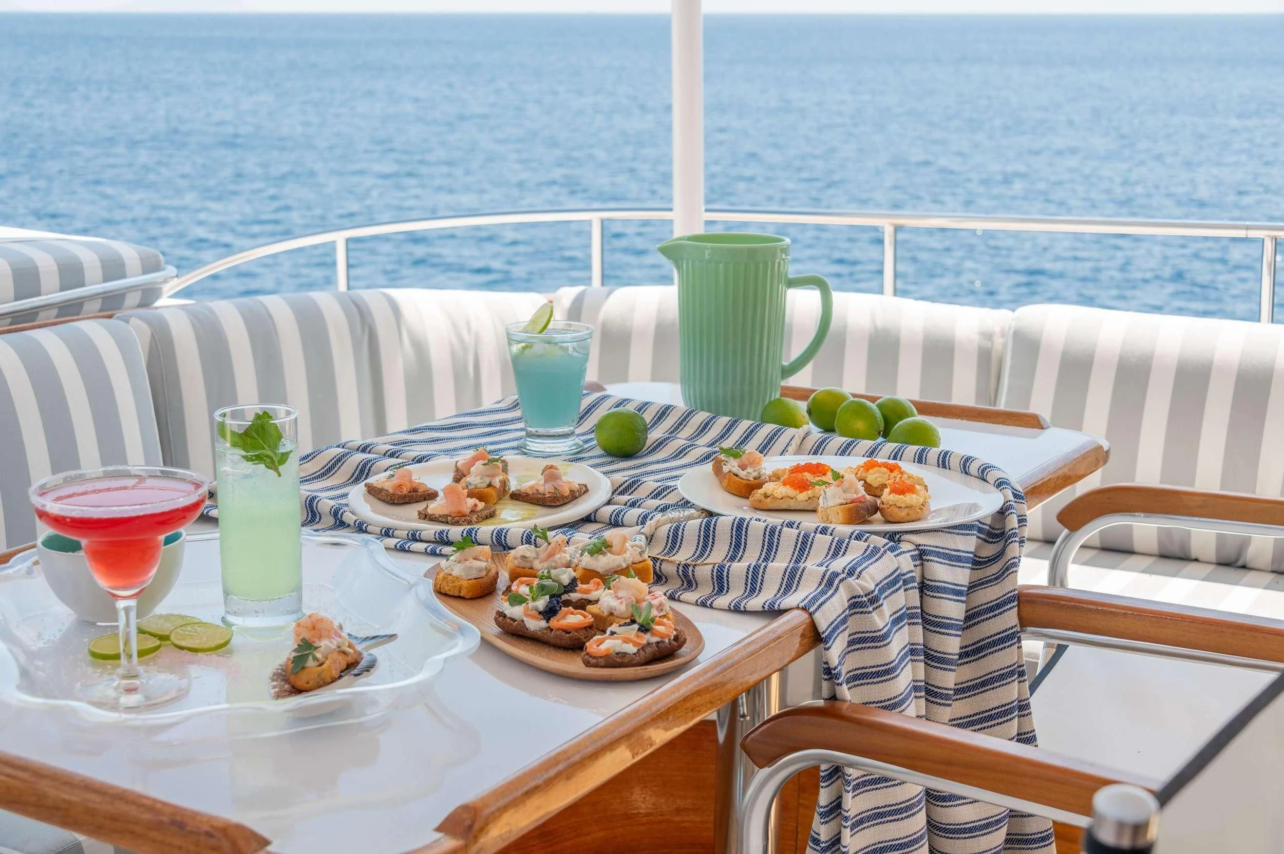 a table with food on it aboard TAKA Yacht for Sale
