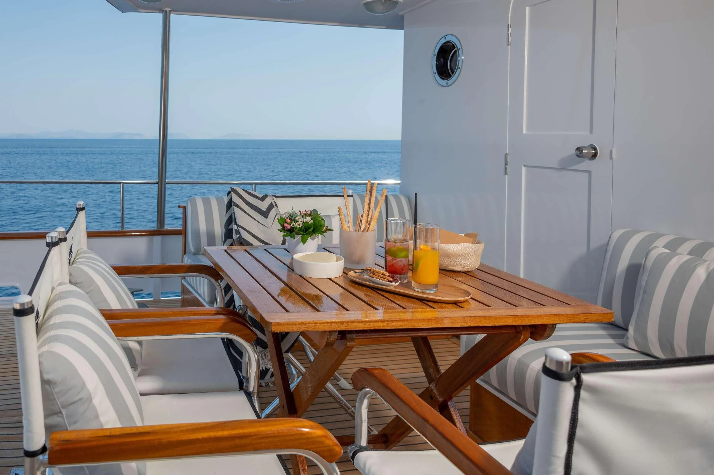 a table with drinks on it aboard TAKA Yacht for Sale