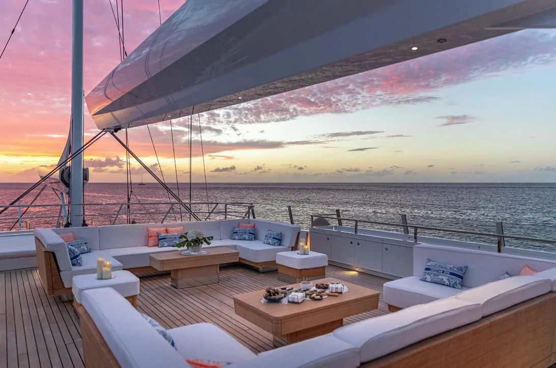 a room with a view of the water and the city below aboard SEA EAGLE Yacht for Sale