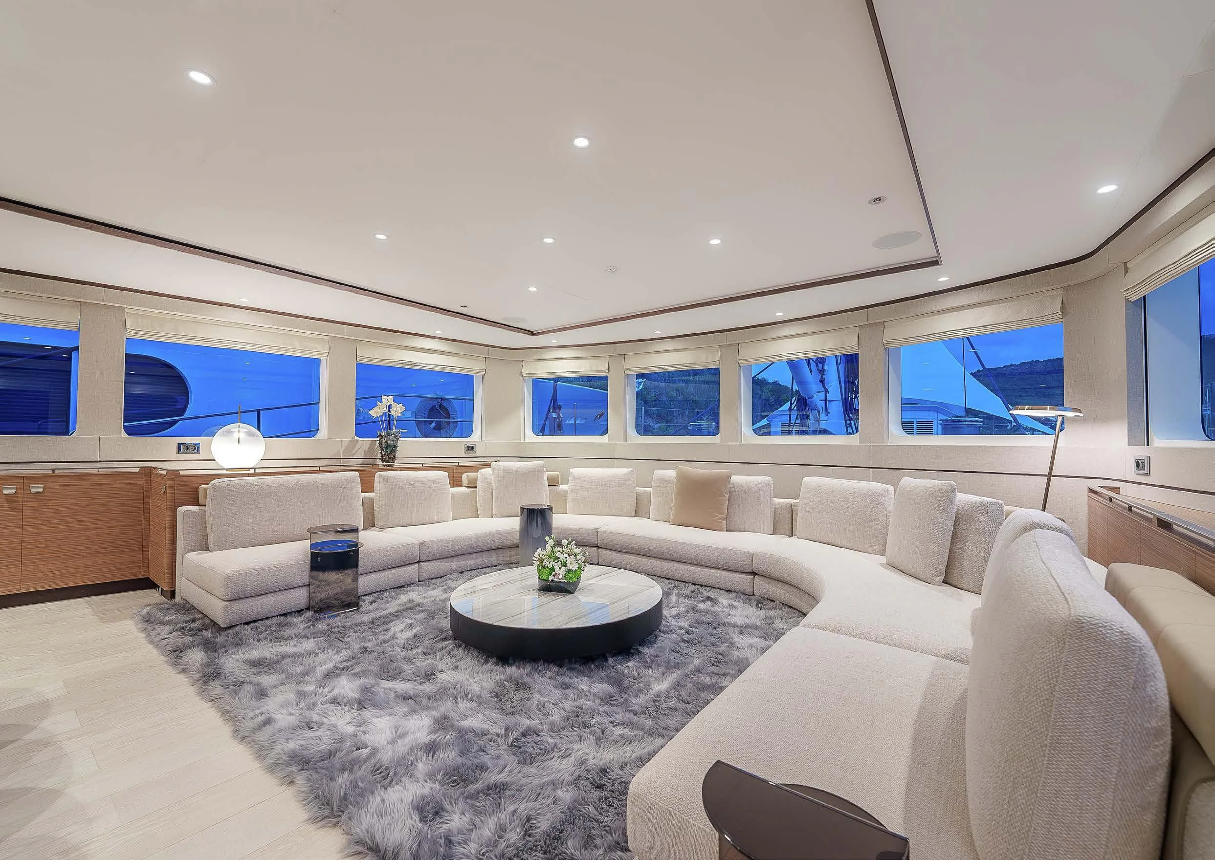 a living room with a couch and a table aboard SEA EAGLE Yacht for Sale