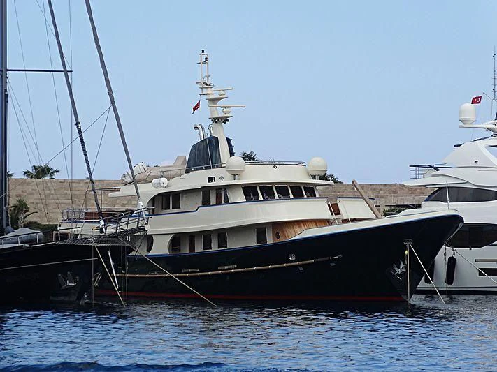 a couple of boats sit in a harbor aboard MESERRET Yacht for Sale