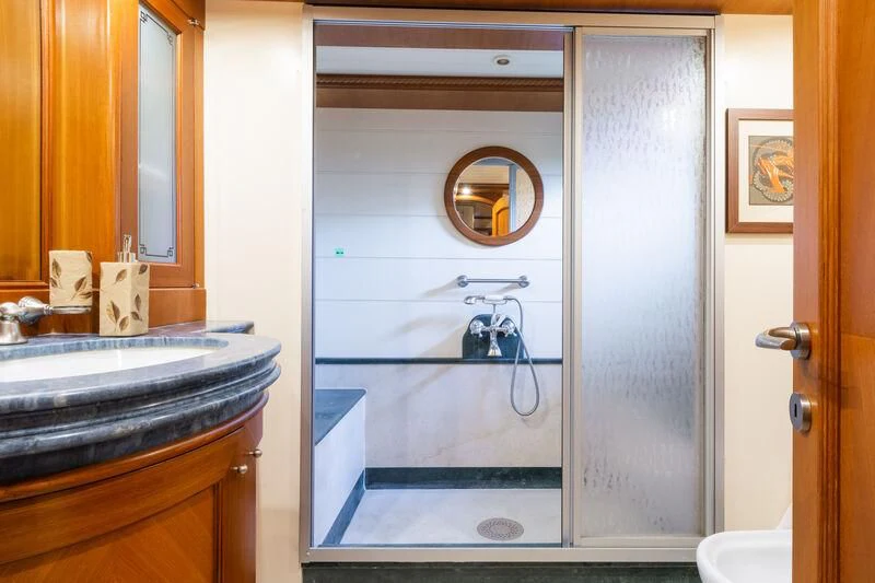 a bathroom with a sink and a mirror aboard MESERRET Yacht for Sale