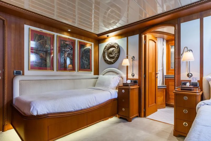 a bedroom with a large bed aboard MESERRET Yacht for Sale