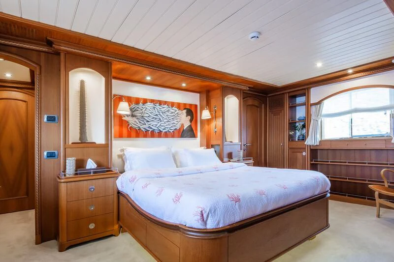 a large bed in a cabin aboard MESERRET Yacht for Sale
