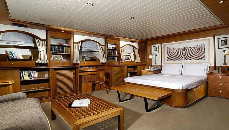 a living room with a bed and a coffee table aboard MESERRET Yacht for Sale