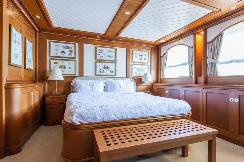 a bedroom with a large bed aboard MESERRET Yacht for Sale