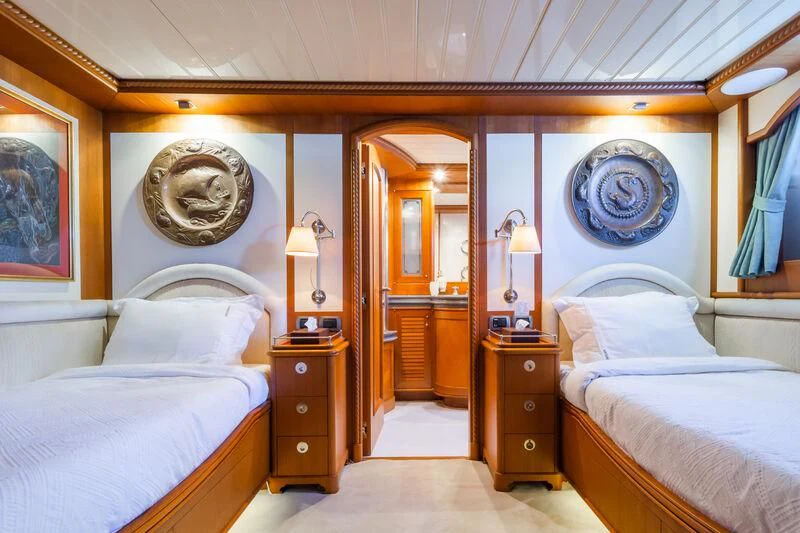 a room with two beds aboard MESERRET Yacht for Sale
