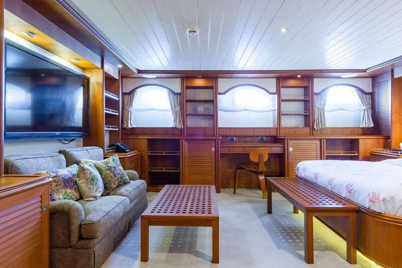 a room with a bed and a tv aboard MESERRET Yacht for Sale