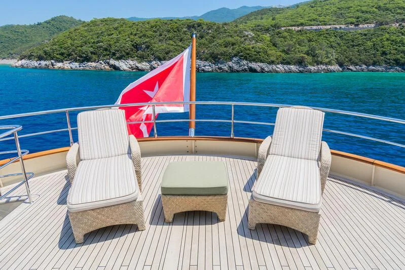 a boat with chairs on it aboard MESERRET Yacht for Sale