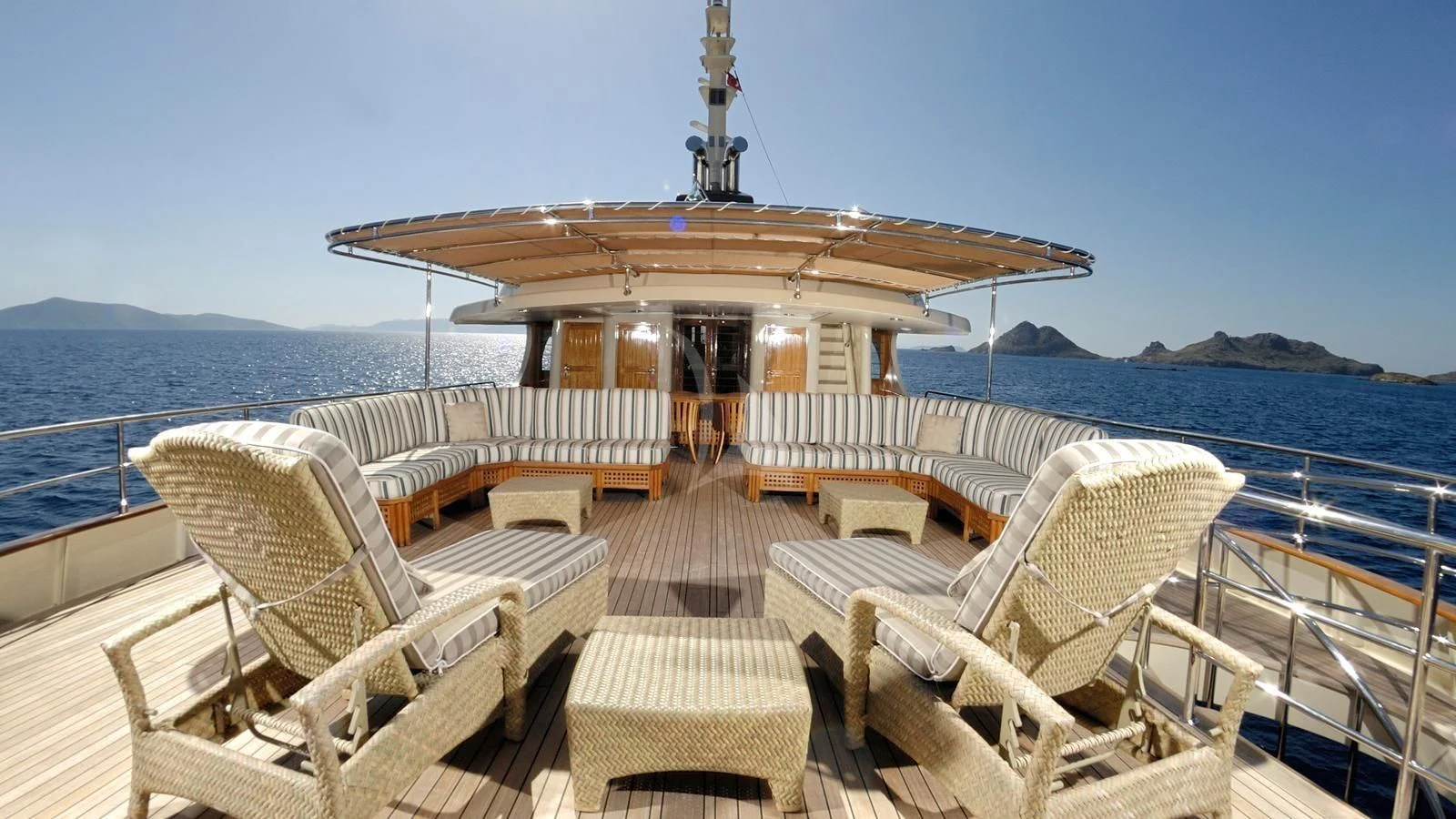 a deck with chairs and a gazebo on it aboard MESERRET Yacht for Sale