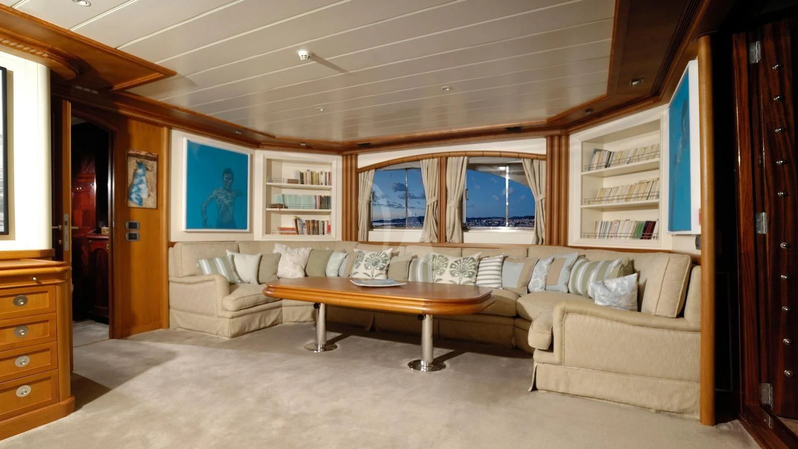 a living room with a couch and a table aboard MESERRET Yacht for Sale