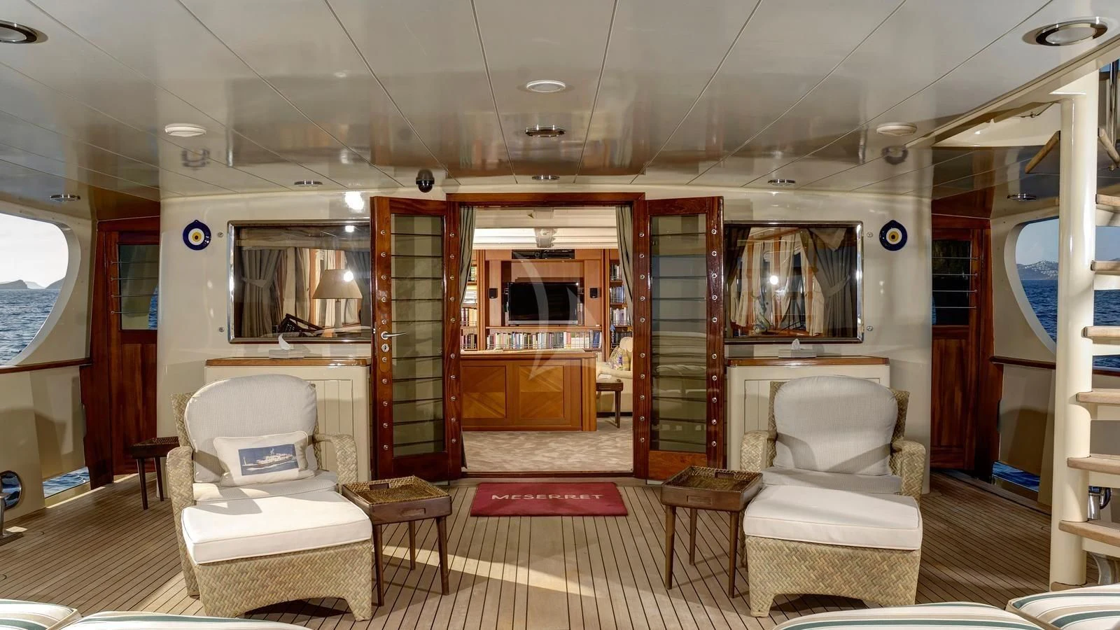 a room with a couch and a television aboard MESERRET Yacht for Sale