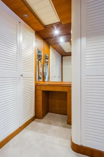 a hallway with white doors aboard MESERRET Yacht for Sale