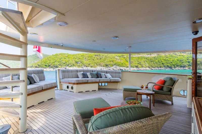 a room with a bed and a couch aboard MESERRET Yacht for Sale