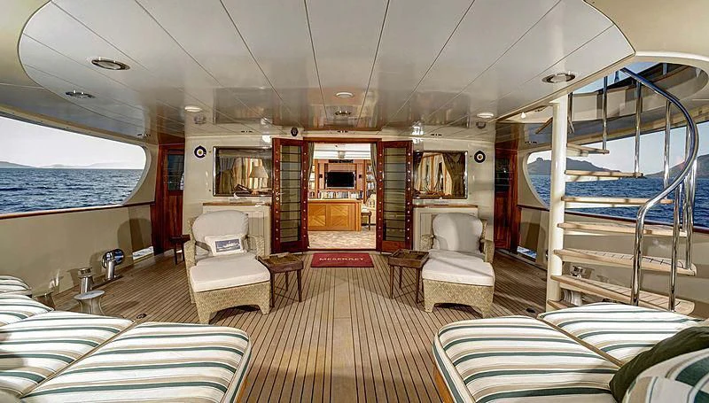 a room with a bed and a chair aboard MESERRET Yacht for Sale