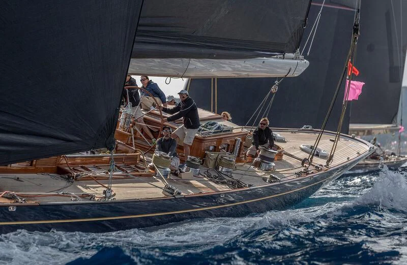a group of people on a sailboat aboard TOPAZ Yacht for Sale