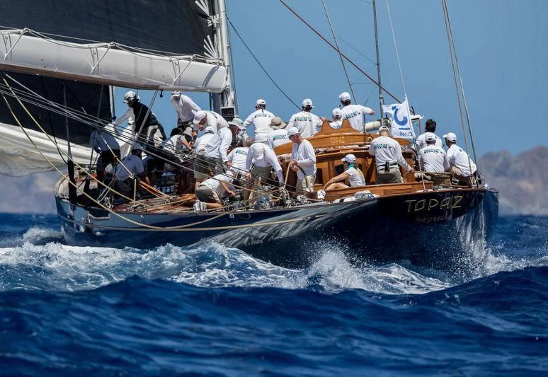 a group of people on a boat aboard TOPAZ Yacht for Sale
