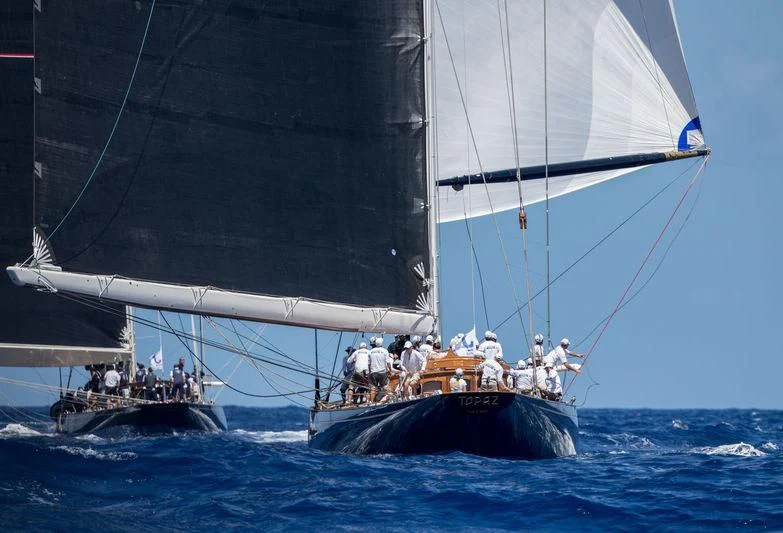 a group of people sailing on a boat aboard TOPAZ Yacht for Sale