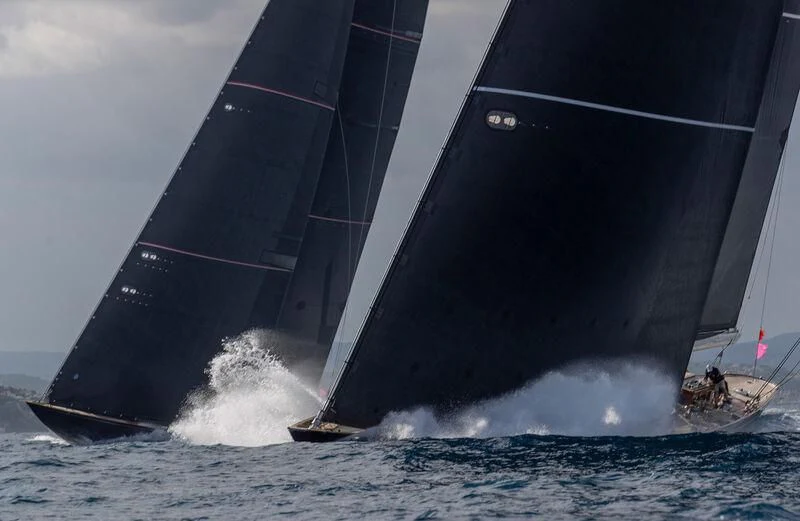 a couple of people sailing on a sailboat aboard TOPAZ Yacht for Sale