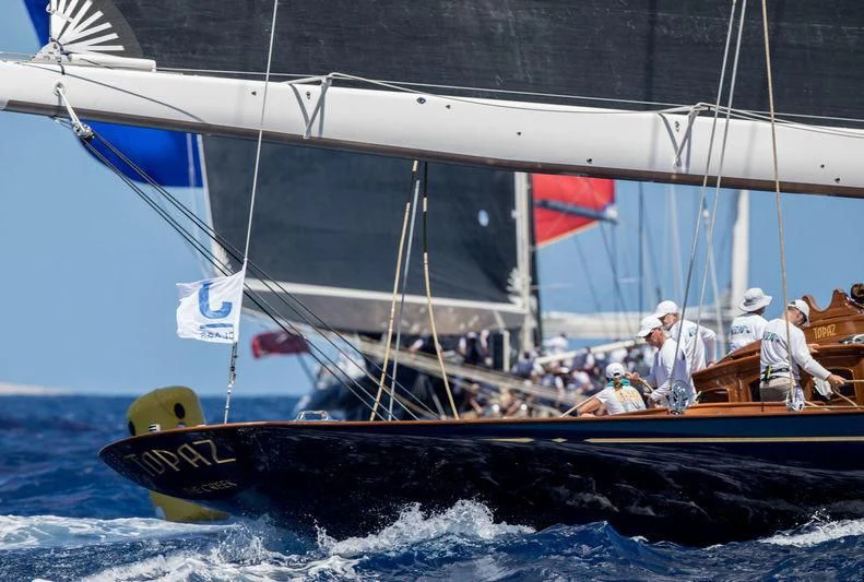 a group of people on a sailboat aboard TOPAZ Yacht for Sale