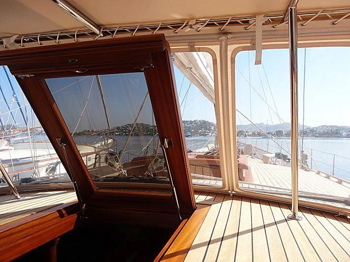 a boat with a large window aboard ILIOS Yacht for Sale