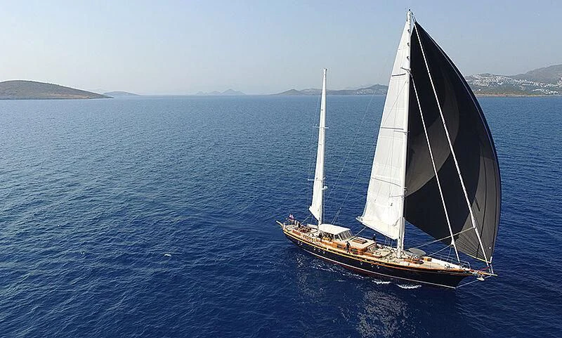 a sailboat on the water aboard ILIOS Yacht for Sale