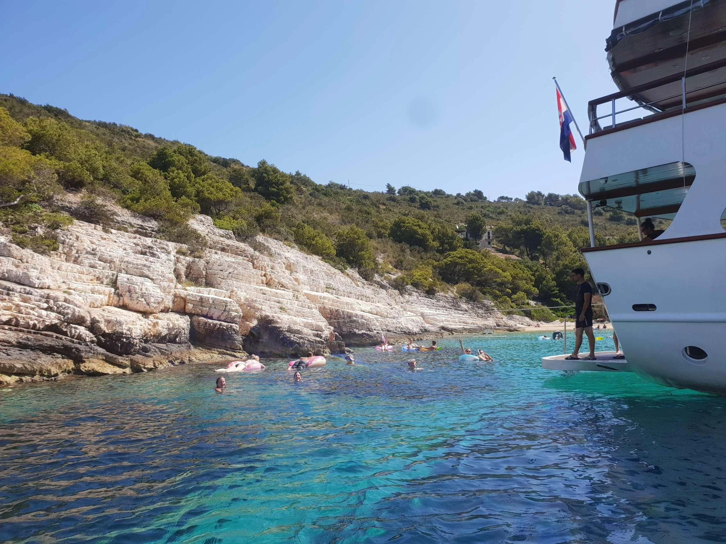 people swimming in the water aboard ALMISSA Yacht for Sale