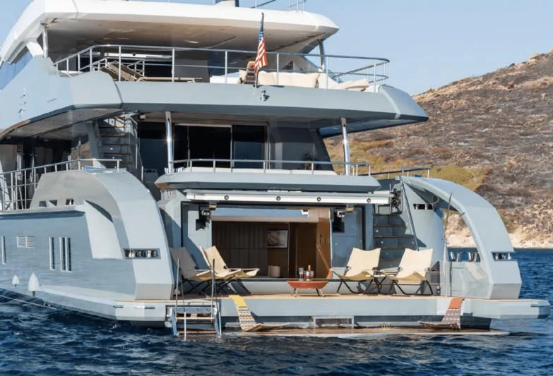 a boat docked at a beach aboard LEONIDAS Yacht for Sale