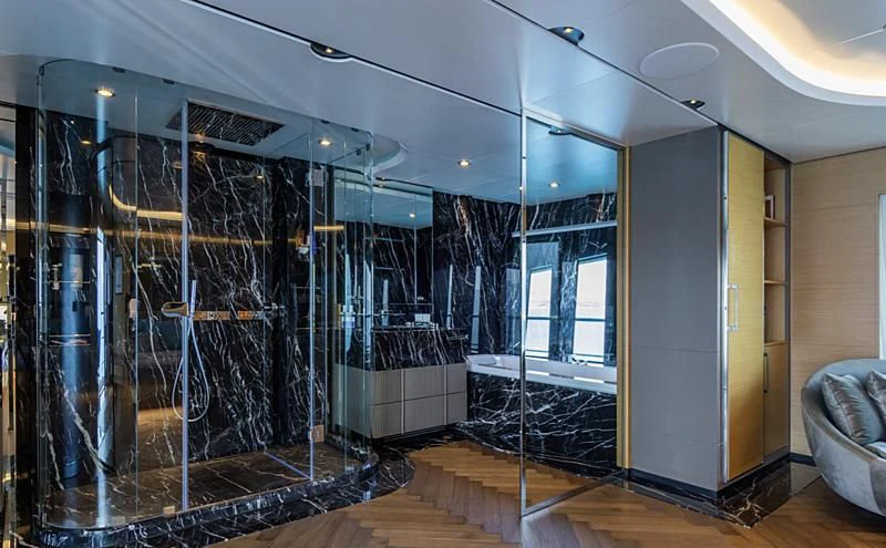 a room with a large glass wall aboard LEONIDAS Yacht for Sale
