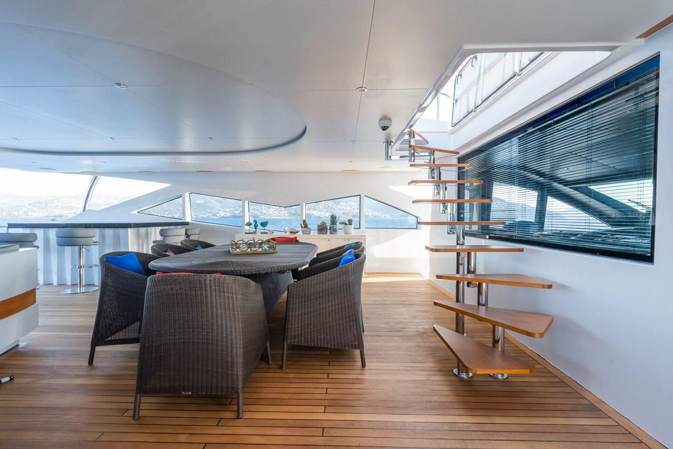 a room with a table and chairs aboard LEONIDAS Yacht for Sale