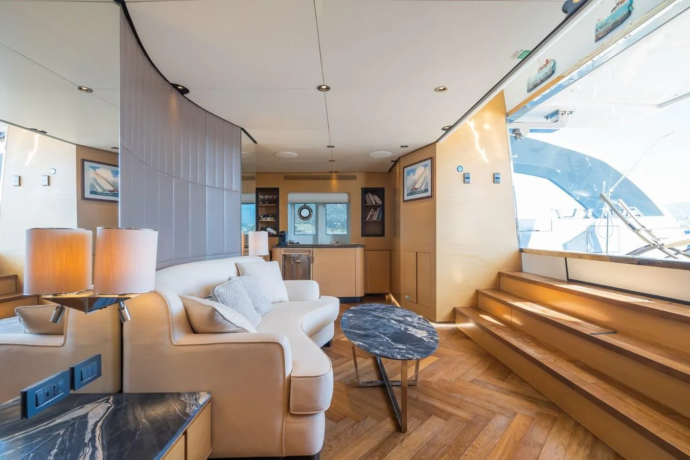 a living room with a large window aboard LEONIDAS Yacht for Sale