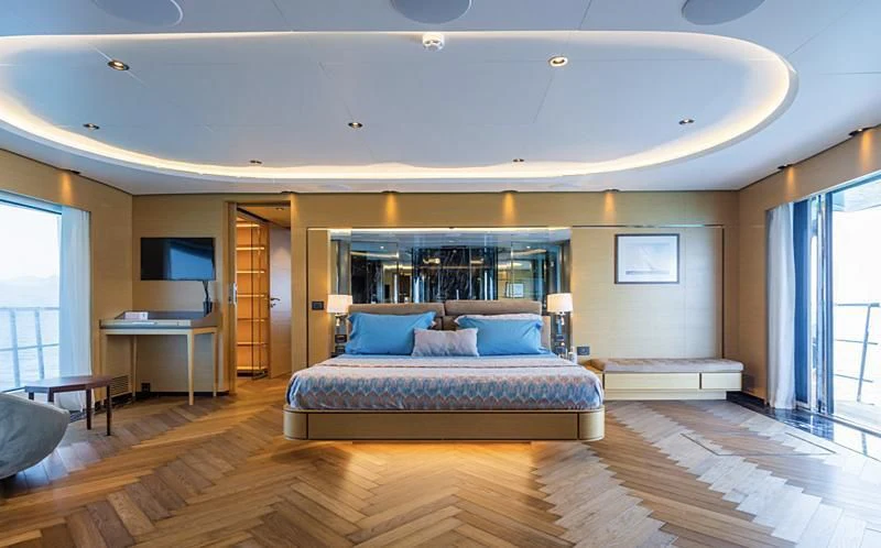 a bedroom with a large bed aboard LEONIDAS Yacht for Sale