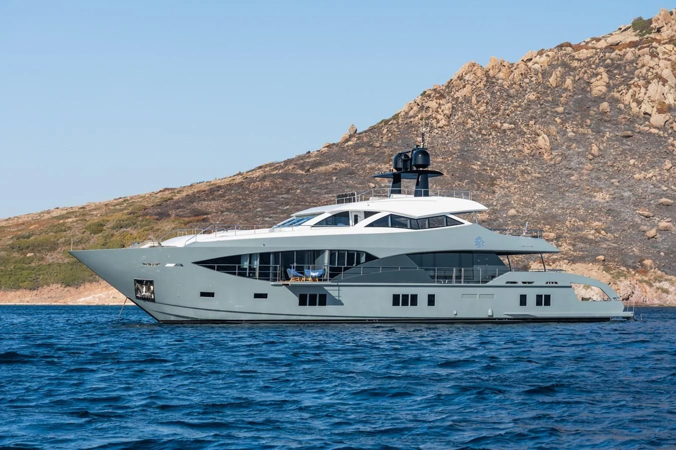 a white yacht on the water aboard LEONIDAS Yacht for Sale