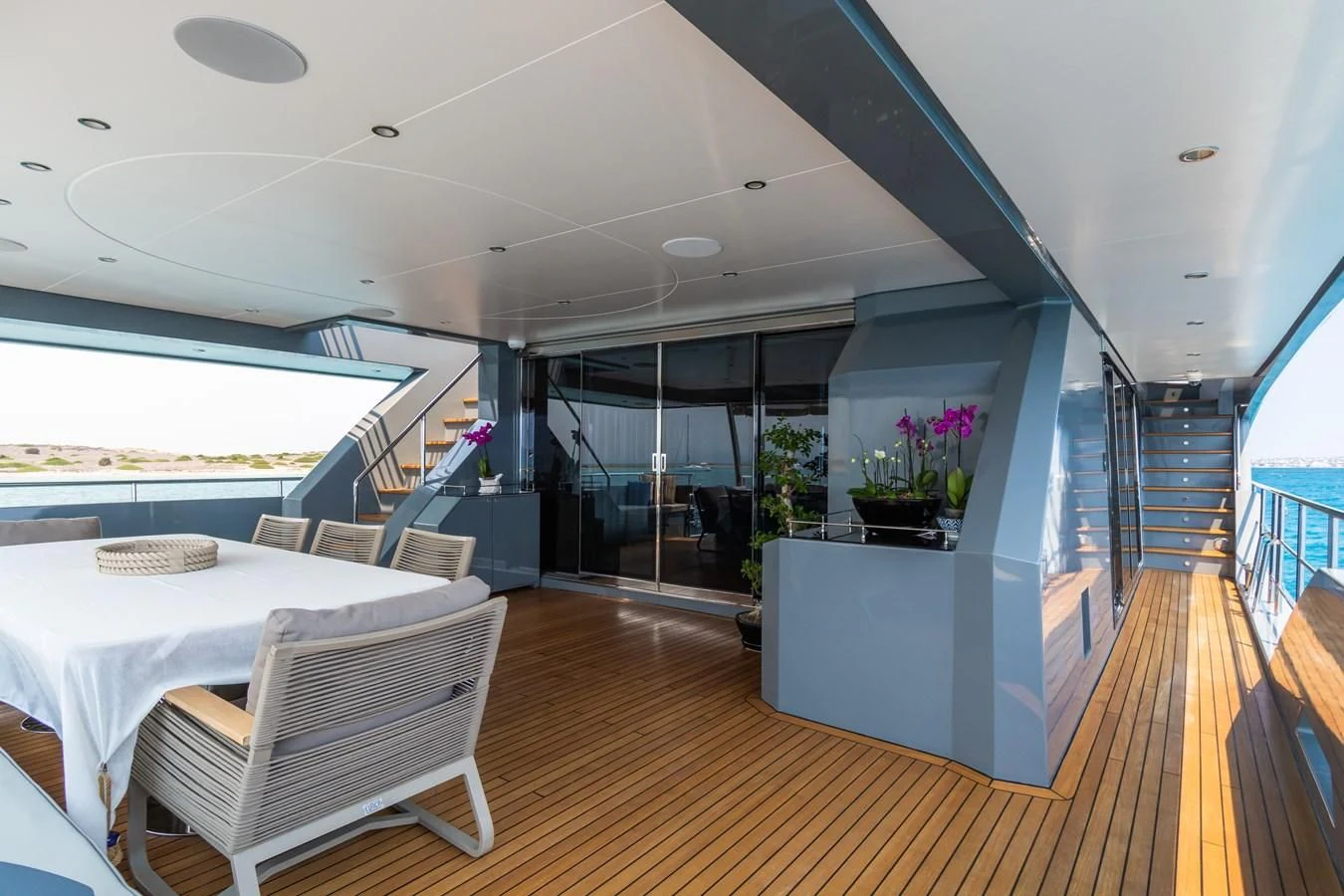 a room with a table and chairs aboard LEONIDAS Yacht for Sale