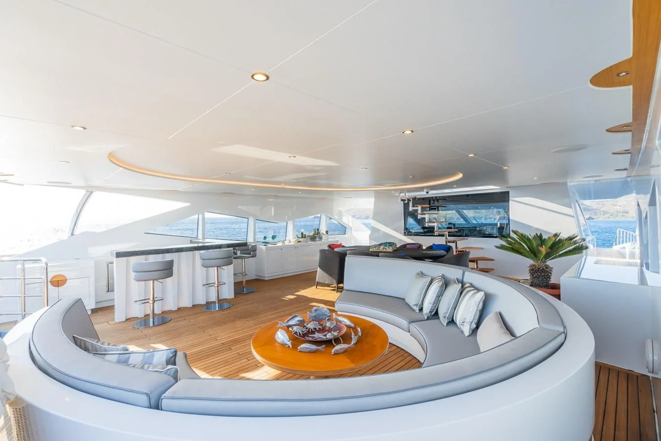 a modern living room with a large open floor plan aboard LEONIDAS Yacht for Sale
