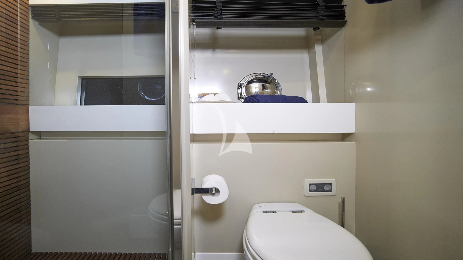 a bathroom with a toilet and a sink aboard FUNKY TOWN Yacht for Sale