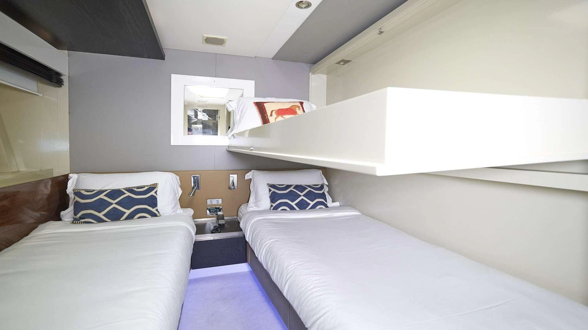 a room with two beds aboard FUNKY TOWN Yacht for Sale