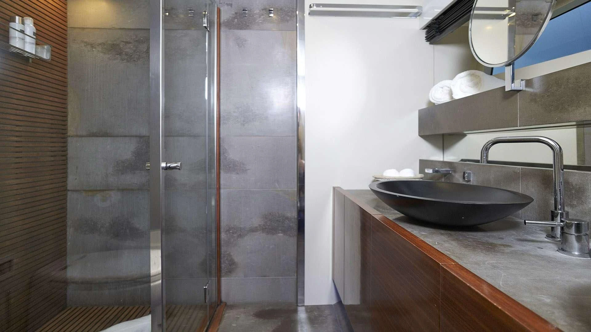 a bathroom with a sink and a shower aboard FUNKY TOWN Yacht for Sale