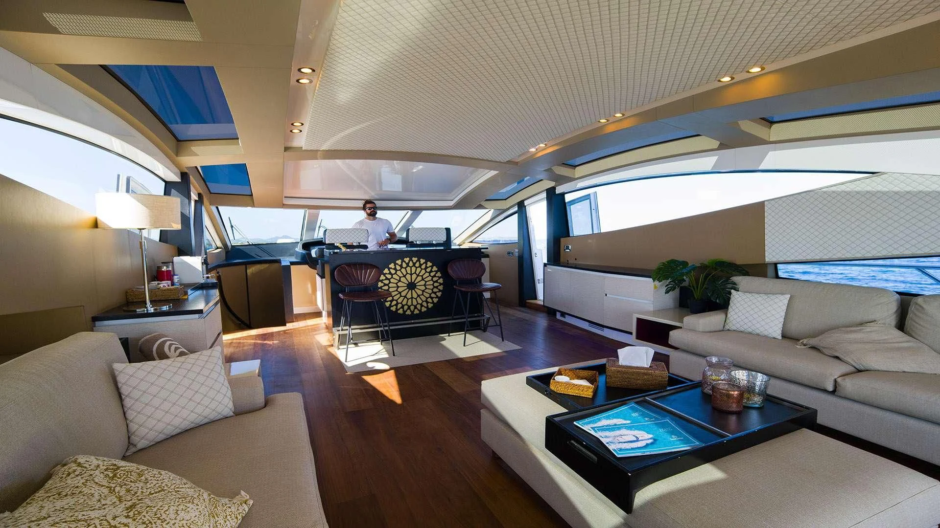 a living room with a large window aboard FUNKY TOWN Yacht for Sale