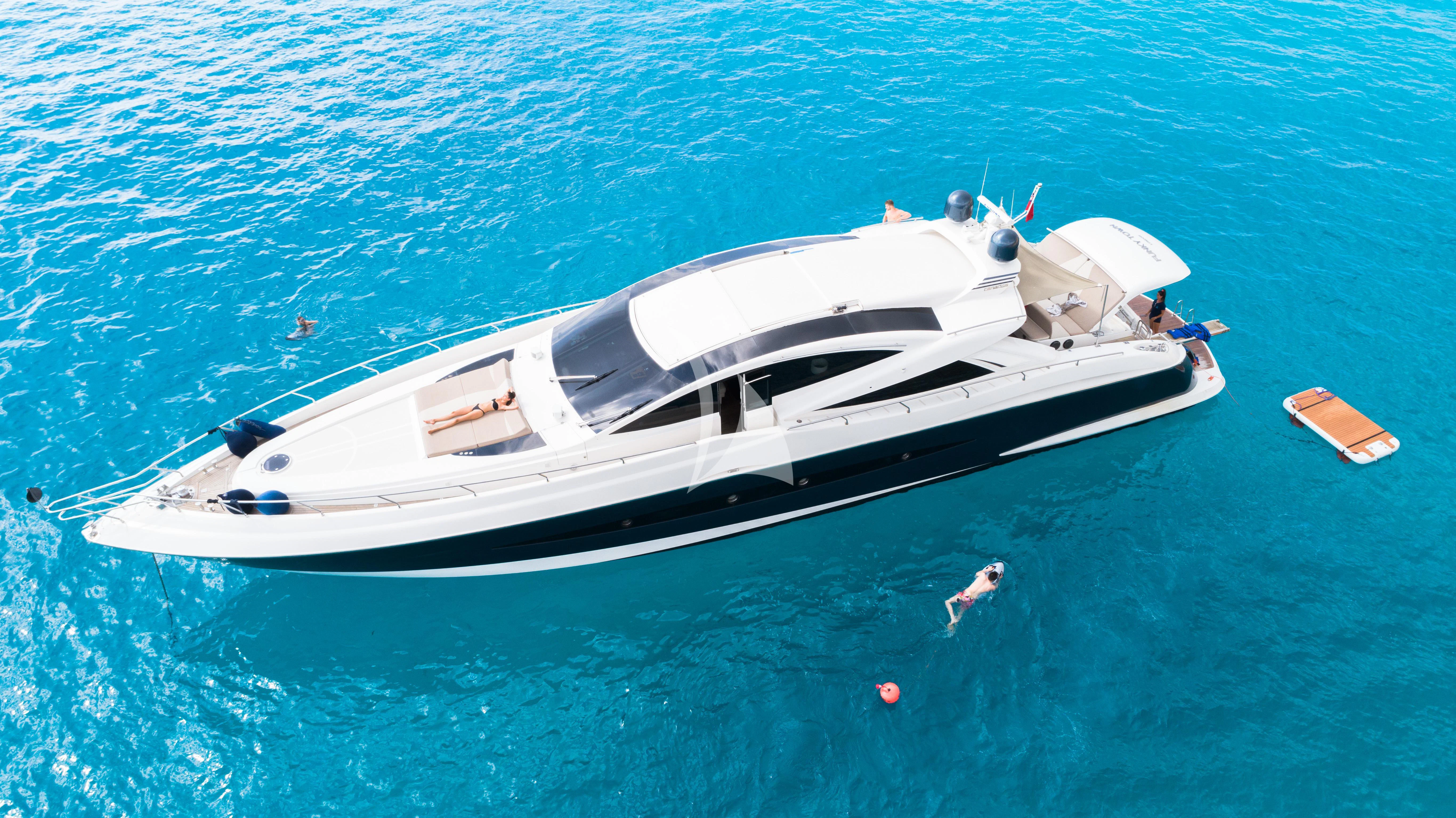 a boat in the water aboard FUNKY TOWN Yacht for Sale