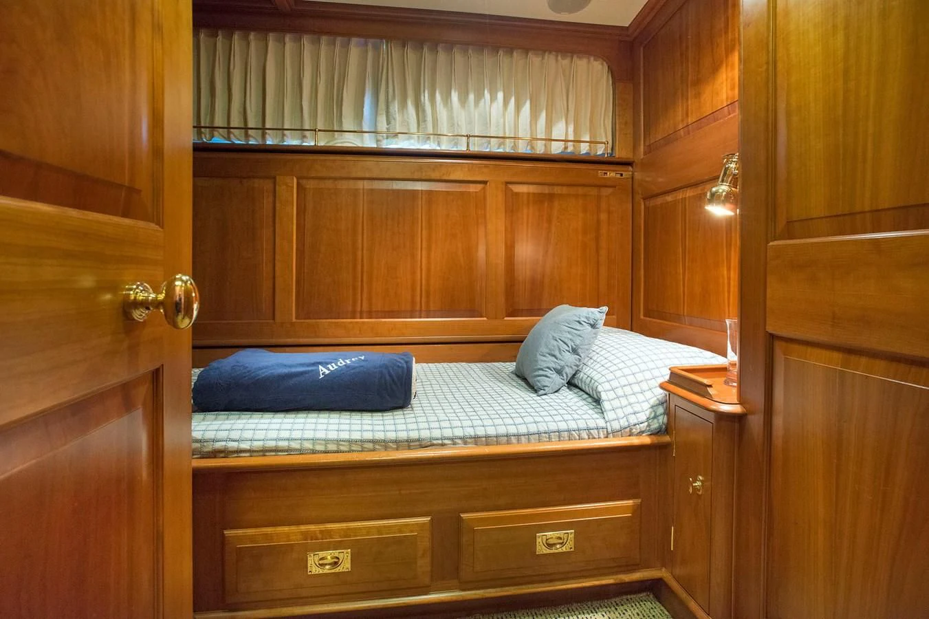 a bed in a room aboard AUDREY II Yacht for Sale