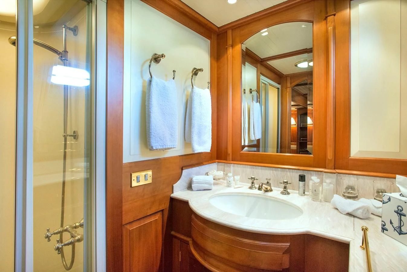 a bathroom with a sink and a shower aboard AUDREY II Yacht for Sale