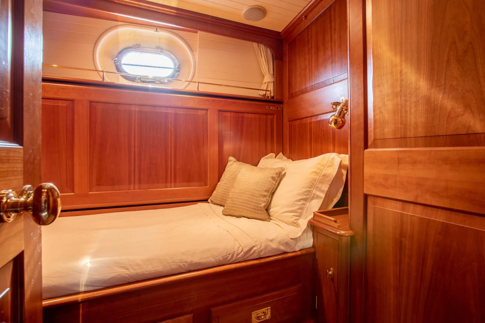 a bed in a room aboard AUDREY II Yacht for Sale