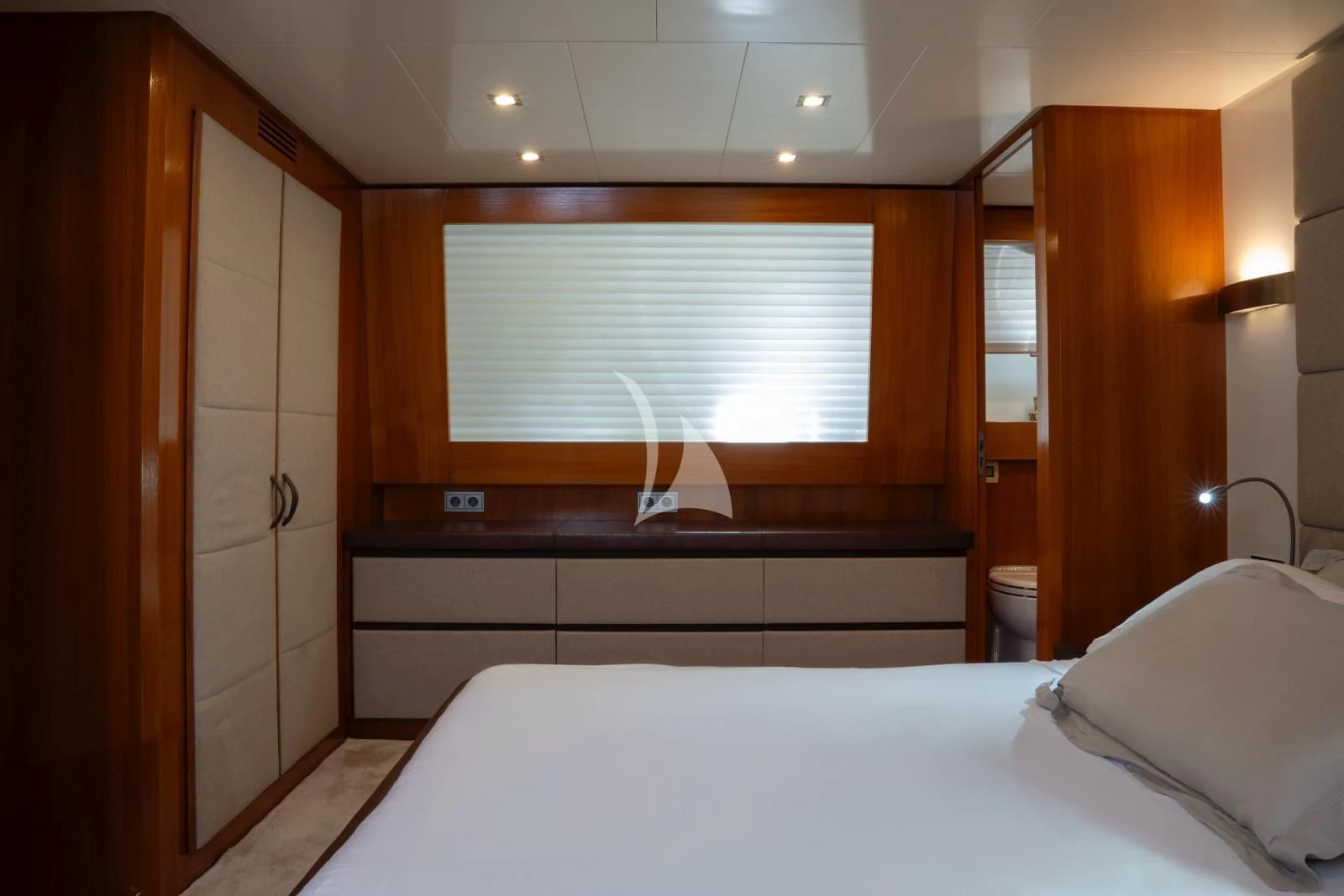a room with a bed and a closet aboard OCEAN DELTA 11 Yacht for Sale