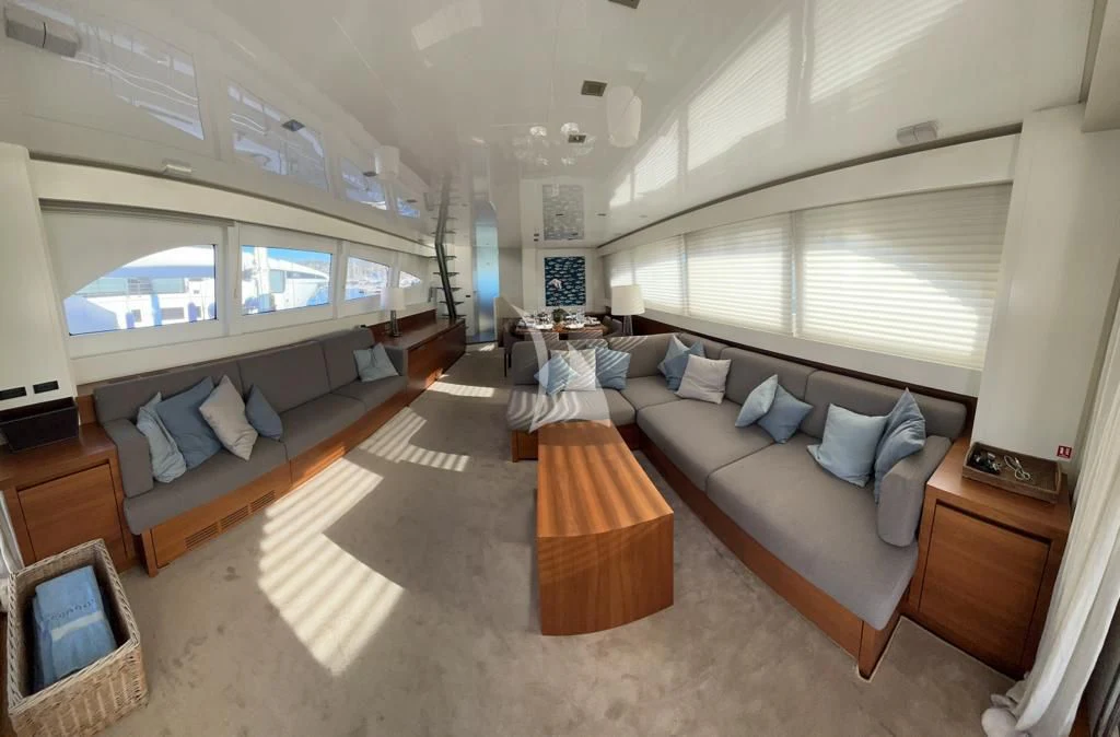 a room with a bed and a couch aboard OCEAN DELTA 11 Yacht for Sale