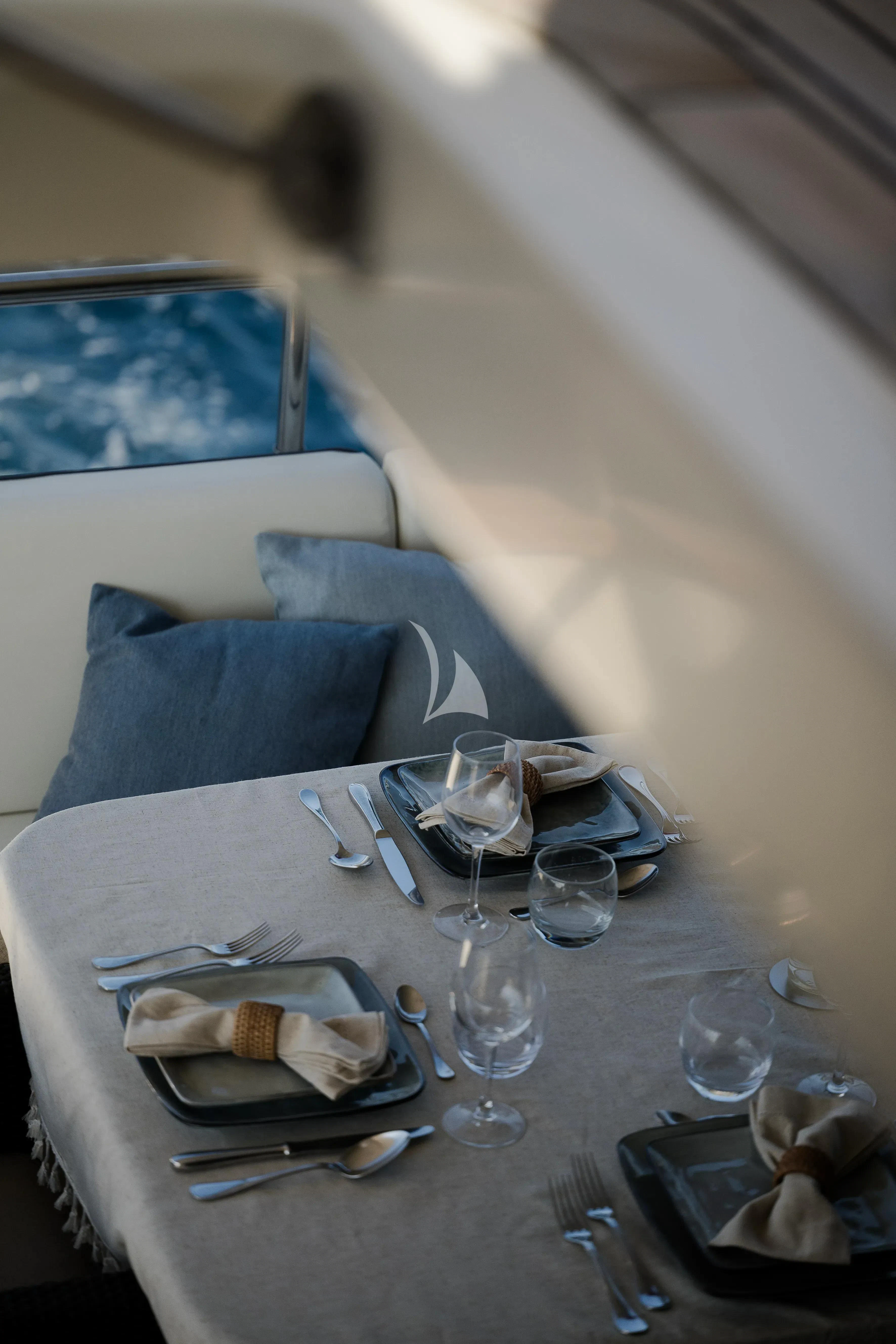 a table with silverware and silverware aboard OCEAN DELTA 11 Yacht for Sale